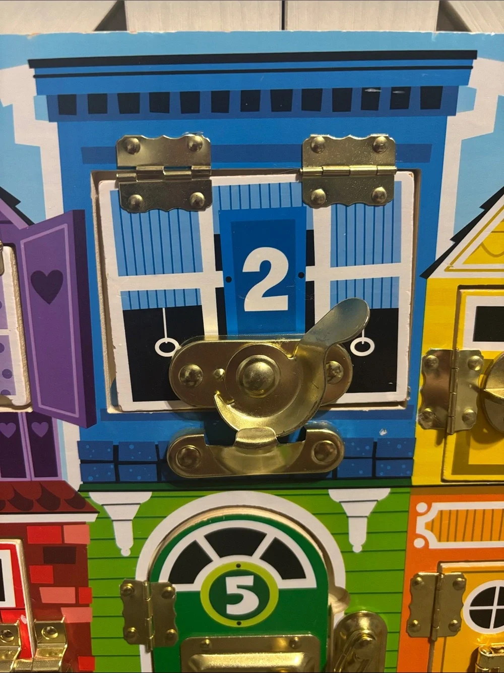 Melissa & Doug Latches Board